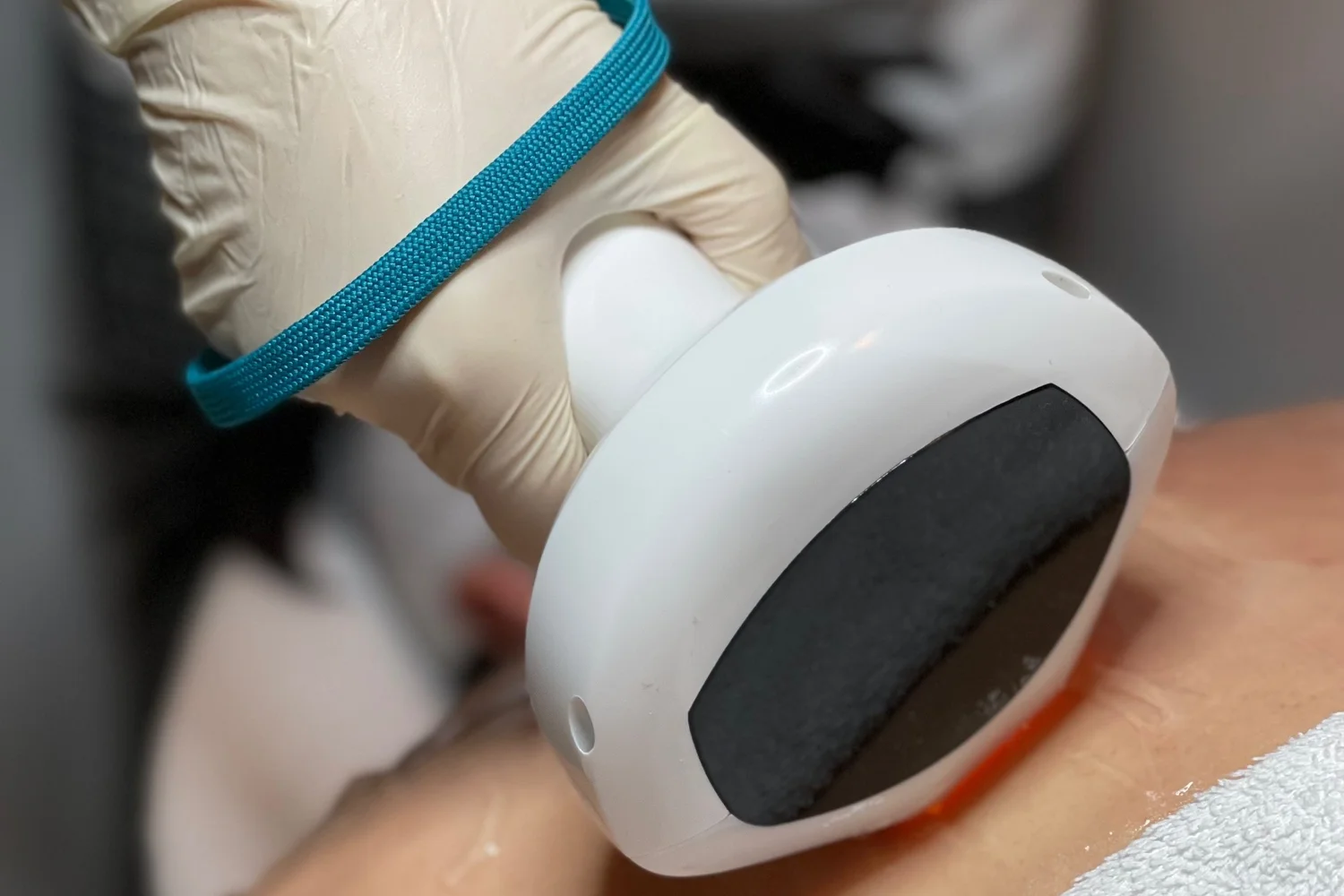 A treatment handpiece in use at Liveo Beauty